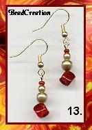 dangle earrings red and gold glass