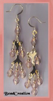 gold chandelier earrings pink glass
