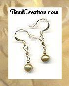 Fresh water gold pearls with 22k gold