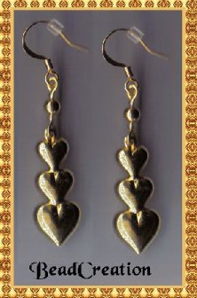 gold heart dangle earrings
